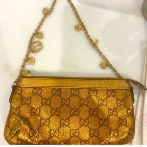 Gold Gucci purse